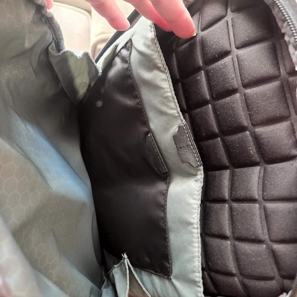 Tumi Black and Cream Backpack